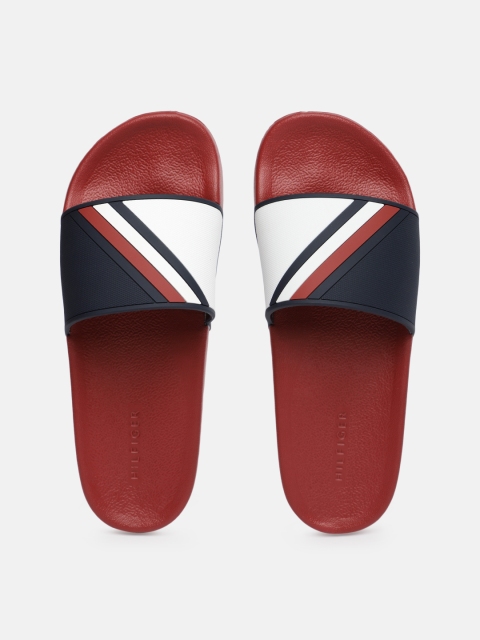 

Tommy Hilfiger Men Navy Blue & White Colourblocked Sliders