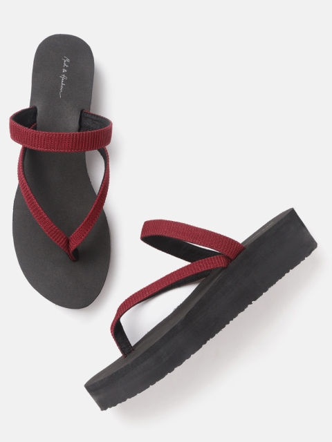 

Mast & Harbour Women Maroon Self-Striped Flip-Flops