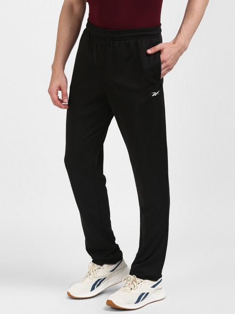 

Reebok Men Black Foundation Solid Training Track Pants