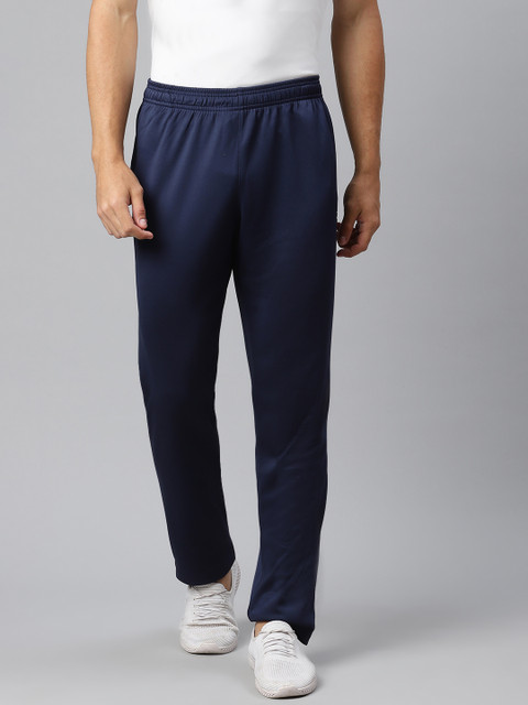 

Reebok Men Navy Foundation Poly Solid Training Track Pants, Navy blue