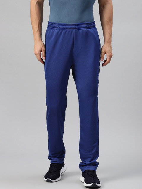 

Reebok Men Blue Solid Regular Tapered Fit RBK STYLE Training Track Pants