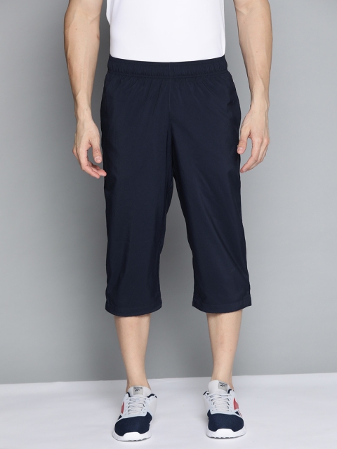 

Reebok Men Navy Blue Three Quarter Regular Training Track Pant