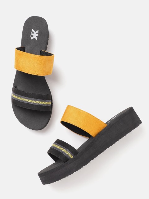 

Kook N Keech Women Mustard Yellow & Black Colourblocked Handcrafted Flip Flops