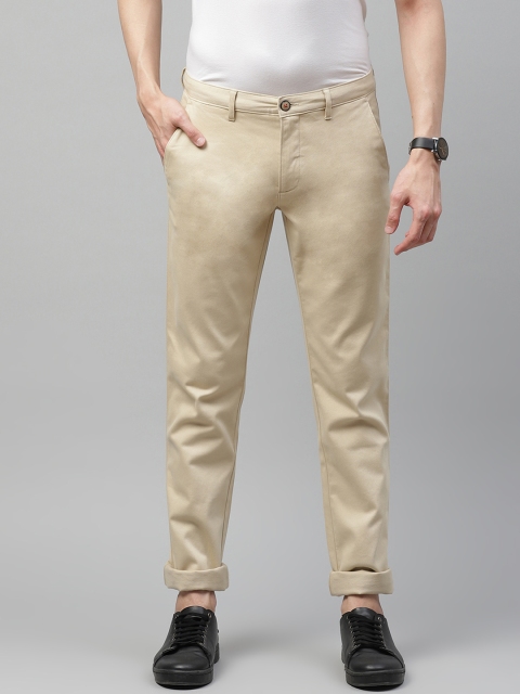 

Louis Philippe Sport Men Beige Textured Tapered Fit Low-Rise Regular Trousers