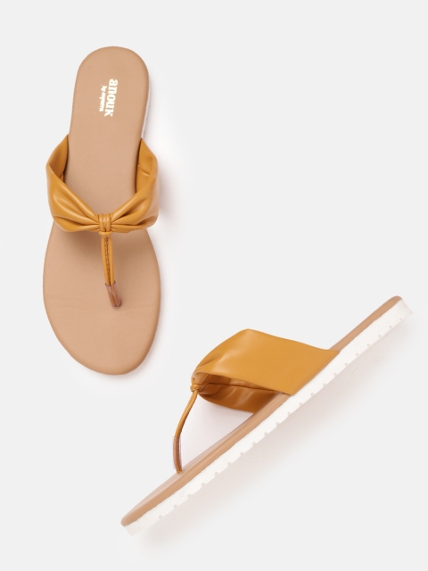 

Anouk Women Mustard Yellow Solid Handcrafted T-Strap Flats with Bow Detail