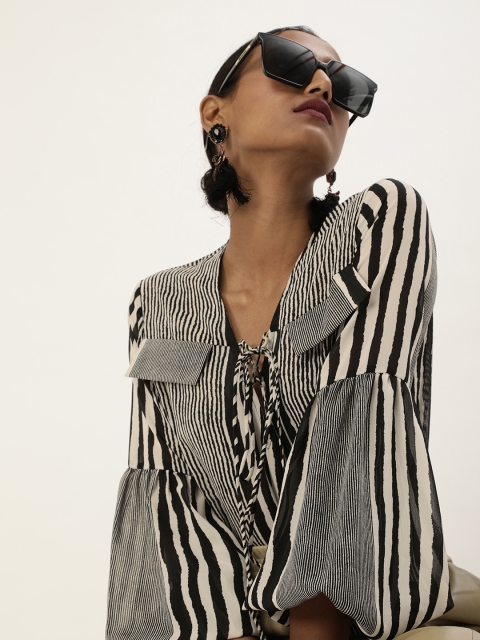 

The Vanca Catchy Black and White Animal Printed Balloon Sleeves Top