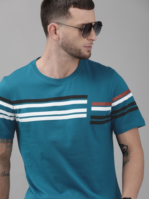 

Roadster Men Teal Blue & White Striped Round Neck T-shirt