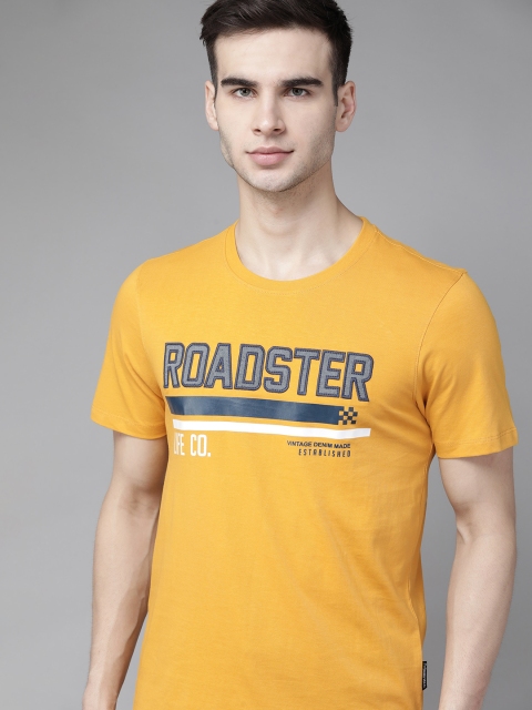 

The Roadster Lifestyle Co Men Mustard Yellow & Navy Blue Pure Cotton Printed T-shirt With Applique Detail