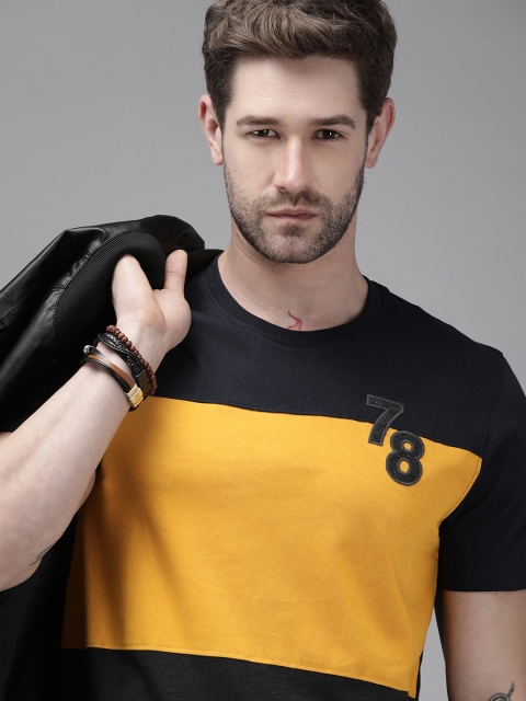 

The Roadster Lifestyle Co Men Yellow Navy Blue Colourblocked Pure Cotton T-shirt