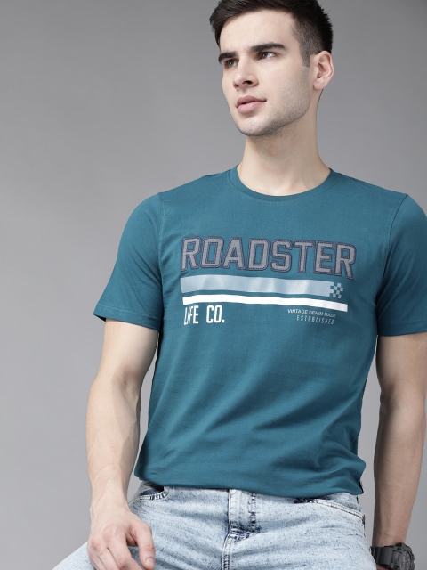 

The Roadster Lifestyle Co Men Teal Green & White Pure Cotton Printed T-shirt With Applique Detail