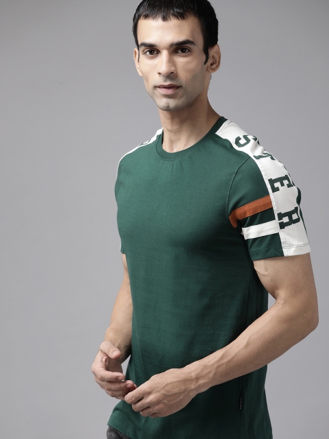 

The Roadster Lifestyle Co Men Green Solid Brand Logo Printed Sleeves Pure Cotton T-shirt