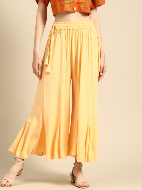 

TAG 7 Women Yellow Solid Crushed Cropped Flared Palazzos
