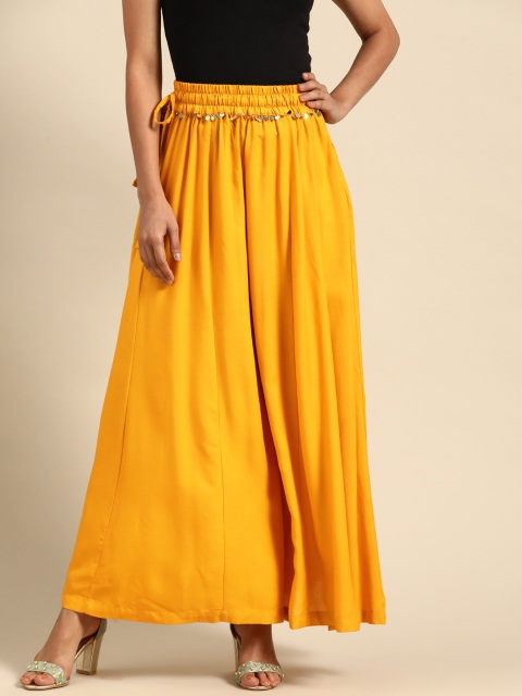 

TAG 7 Women Mustard Yellow Solid Flared Palazzos
