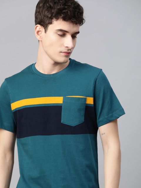 

The Roadster Lifestyle Co Men Teal Green Pure Cotton Colourblocked T-shirt