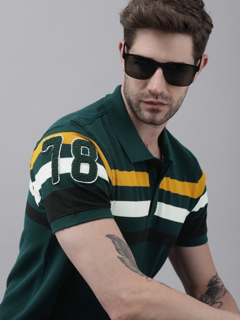 

Roadster Men Green & White Striped Polo Collar T-shirt