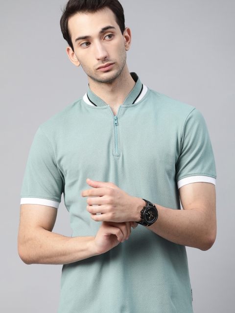 

Roadster Men Green Solid Pure Cotton Polo Collar Pure Cotton T-shirt