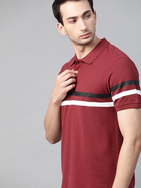 

The Roadster Lifestyle Co Men Maroon Pure Cotton Solid Polo Collar Pure Cotton T-shirt