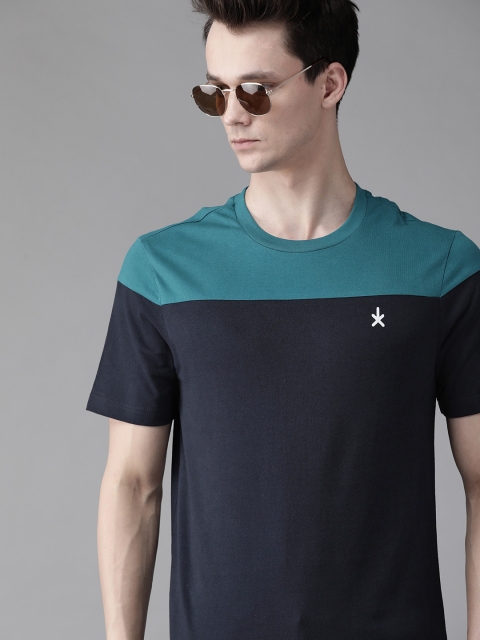 

The Roadster Lifestyle Co Men Navy Blue Pure Cotton Colourblocked Round Neck T-shirt