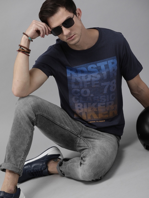 

The Roadster Lifestyle Co Men Navy Blue Brand Logo Printed Pure Cotton T-shirt