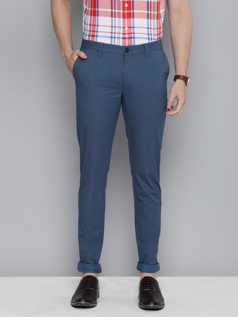

Indian Terrain Men Teal Blue Kruger Fit Self Design Regular Trousers