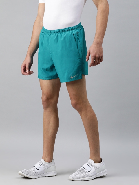 

Nike Men Turquoise Blue Solid Regular Fit DRI_FIT CHALLENGER Running Sports Shorts