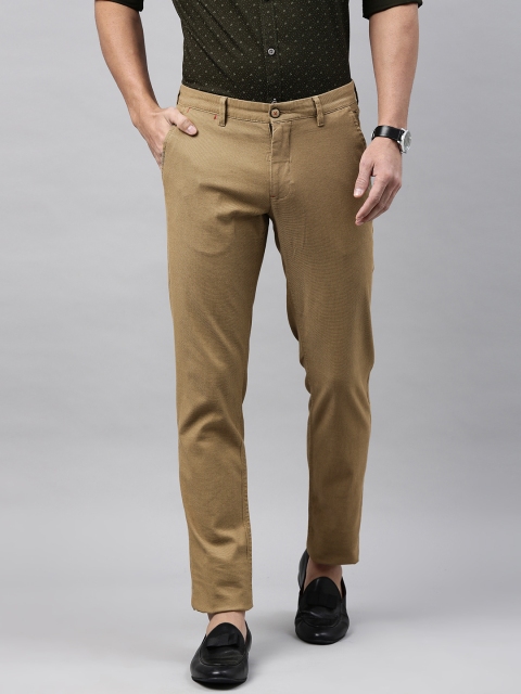 

Louis Philippe Sport Men Khaki Tapered Fit Self Design Regular Trousers