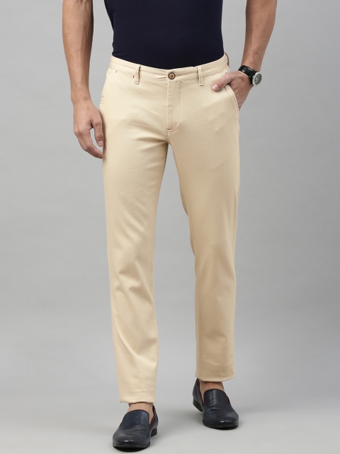 

Louis Philippe Sport Men Cream-Coloured Slim Fit Self Design Regular Trousers