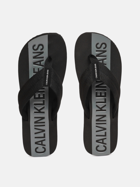 

Calvin Klein Men Black & Grey Solid Thong Flip-Flops