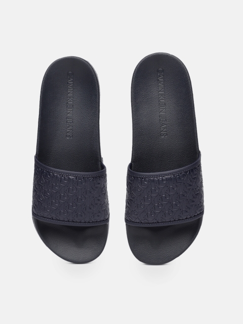 

Calvin Klein Men Navy Blue Self Design Sliders