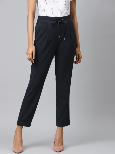 

Marks & Spencer Women Navy Blue Tapered Fit Solid Regular Sustainable Cropped Trousers