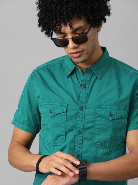 

The Roadster Lifestyle Co Men Teal Blue Solid Casual Shirt