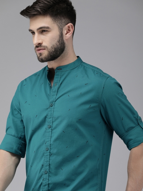 

The Roadster Lifestyle Co Men Teal Blue Printed Casual Shirt