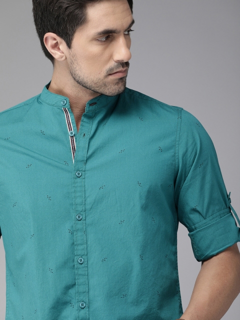 

Roadster Men Teal Green & Black Regular Fit Printed Casual Shirt