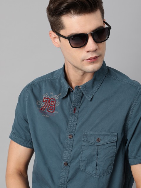 

The Roadster Lifestyle Co Men Navy Blue Solid Pure Cotton Casual Shirt