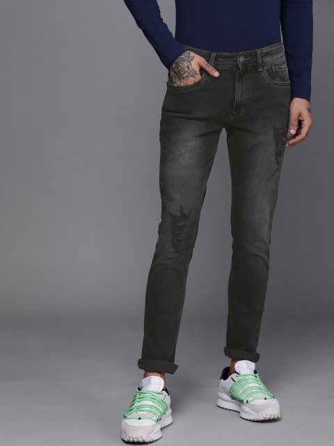 

WROGN Men Black Slim Fit Mildly Distressed Light Fade Stretchable Jeans