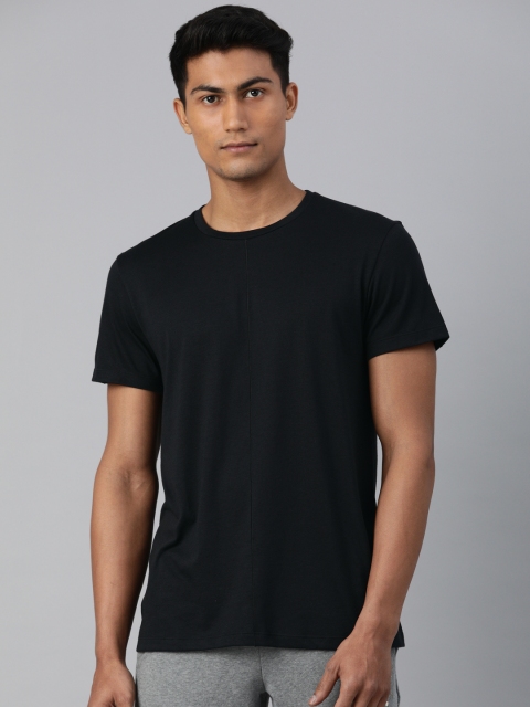 

Nike Men Black Solid CORE YOGA Round Neck T-shirt