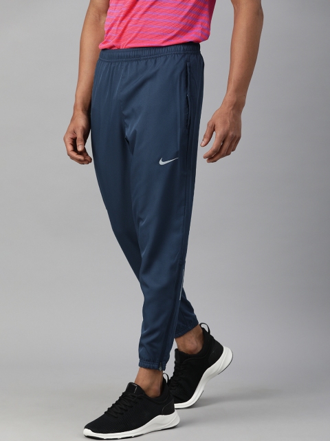 

Nike Men Teal Blue Solid Dri-Fit Straight Fit Essential Running Joggers