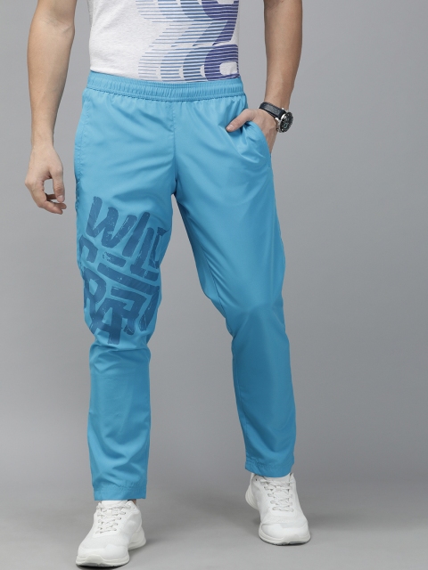 

Wildcraft Men Turquoise Blue Solid Straight Fit Track Pants with Printed Detail