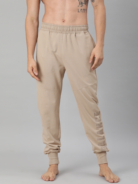 

HRX By Hrithik Roshan Men Beige Typographic Regular Organic Cotton Bio-Wash Yoga Sustainable Joggers