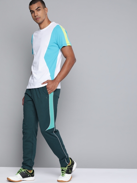 

HRX By Hrithik Roshan Men Ponderosa Pine &Pool Green Solid Regular Fit Bio-Wash Lifestyle Track Pants