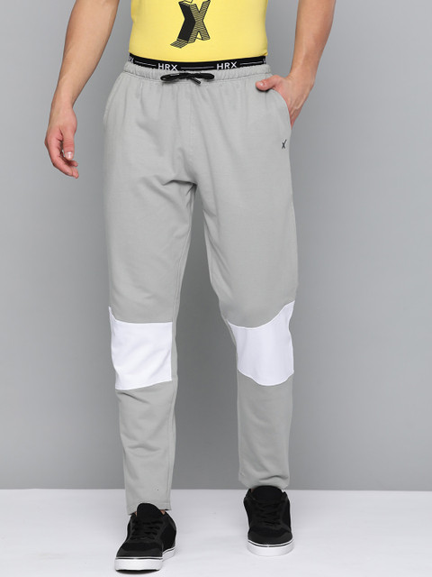 

HRX By Hrithik Roshan Men Wet Weather &Optic White Colourblock Regular Fit Melange Bio-Wash Silicone Finish Lifestyle Track Pants, Grey