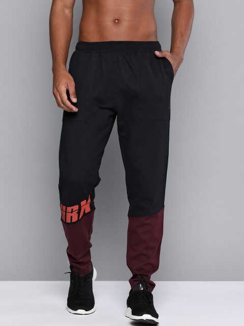 

HRX By Hrithik Roshan Men Jet Black &Fig Colourblock Regular Fit Bio-Wash Lifestyle Track Pants