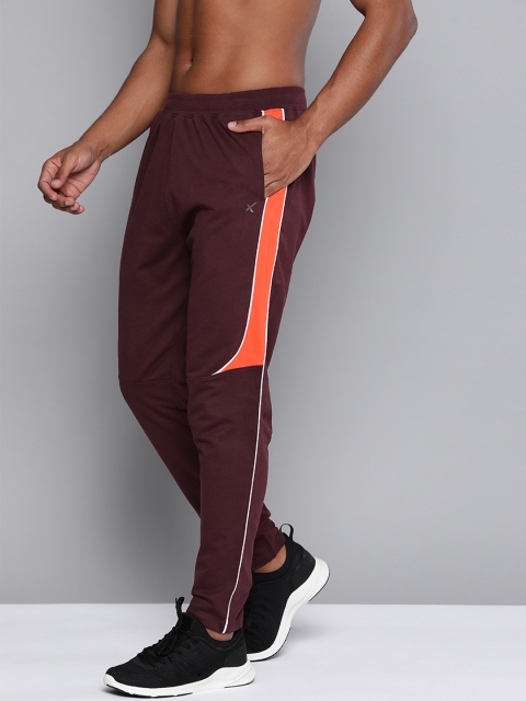 

HRX By Hrithik Roshan Men Fig &Orangeade Solid Regular Fit Bio-Wash Lifestyle Track Pants, Burgundy