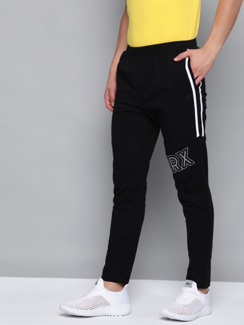 

HRX By Hrithik Roshan Men Jet Black Solid Regular Fit Bio-Wash Lifestyle Track Pants