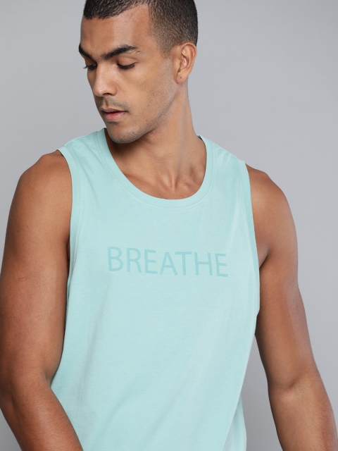 

HRX By Hrithik Roshan Men Aquifier Typographic Organic Cotton Bio-Wash Antimicrobial Yoga Tshirt, Turquoise blue