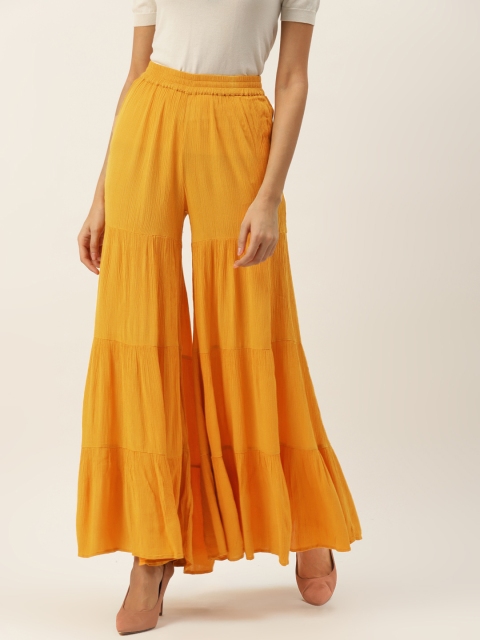

PIRKO Women Mustard Yellow Solid Flared Palazzos