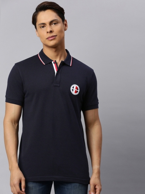 

Tommy Hilfiger Men Navy Blue Solid Pure Cotton Polo Collar T-shirt