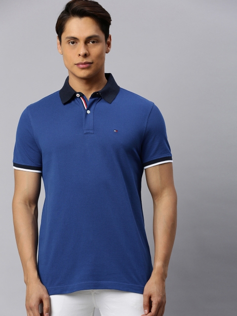 

Tommy Hilfiger Men Blue Solid Polo Collar T-shirt