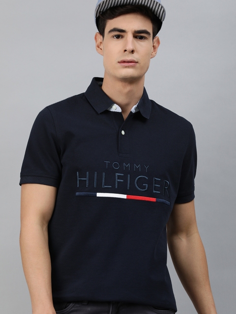 

Tommy Hilfiger Men Navy Blue Pure Cotton Self Design Polo Collar T-shirt