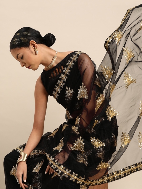 

SHAVYA Women Black & Golden Net Embellished Saree with Sequined Detail